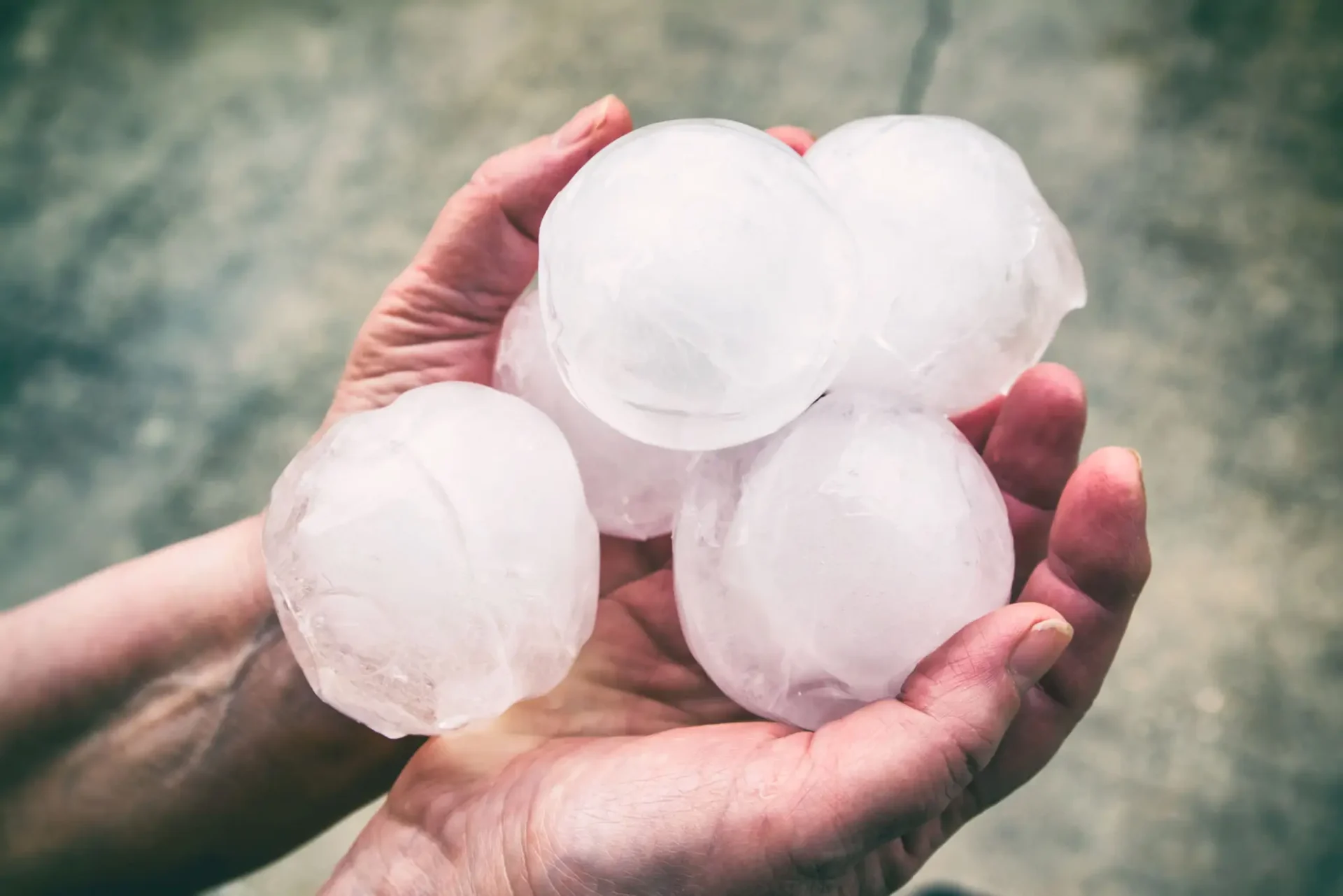 closeup shot of the ice balls in hands