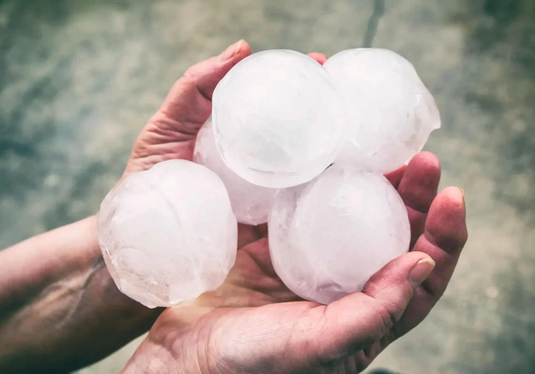 closeup shot of the ice balls in hands